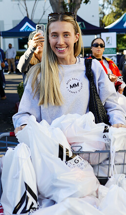 A volunteer at the spring harvest event