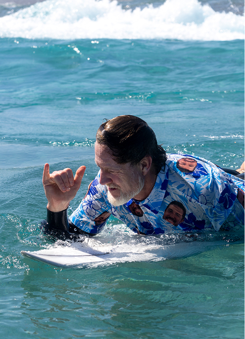 Photo of a person surfing.