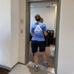 A volunteer wearing an Allgire Foundation shirt