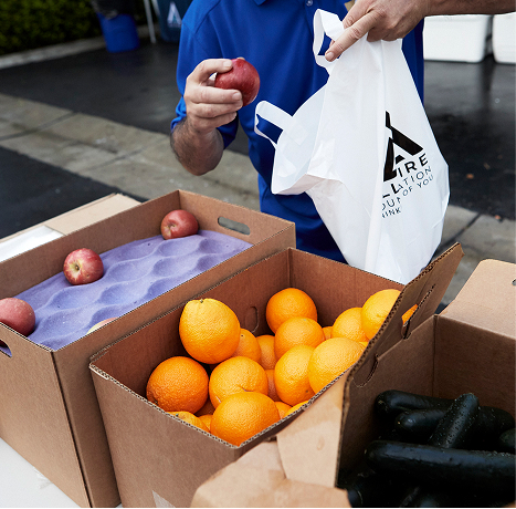 A close of photograph of a box of oranges at spring harvest 2022