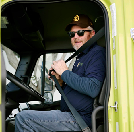 Volunteer driving a truck